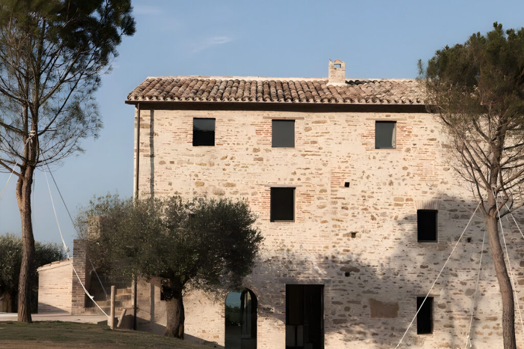 Restored Tuscan farmhouse surrounded by the countryside and maritime pines