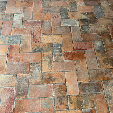 Antique terracotta floor tiles restored and reused in a Tuscan home
